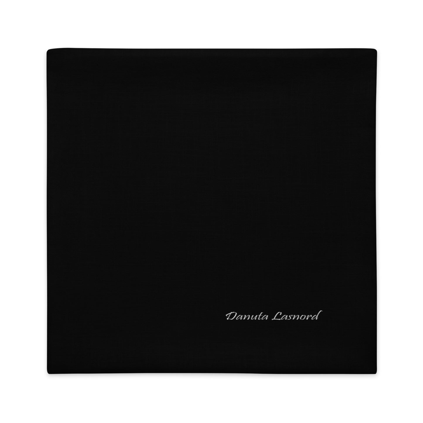 Black square pillow case with 'Danuta Lasnord' branding. Designer nordic cushion covers for livingroom