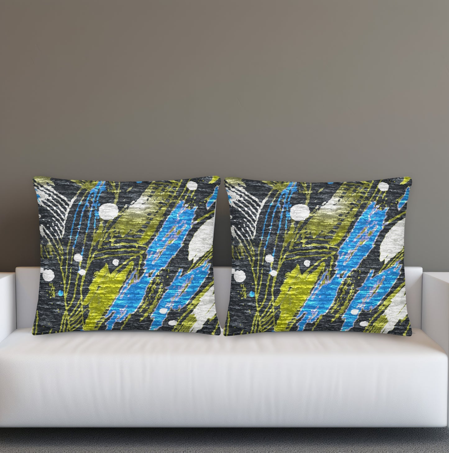 Decorative pillow with a floral pattern on a white sofa for gray interior. Scandinavian designer cushion for cozy home