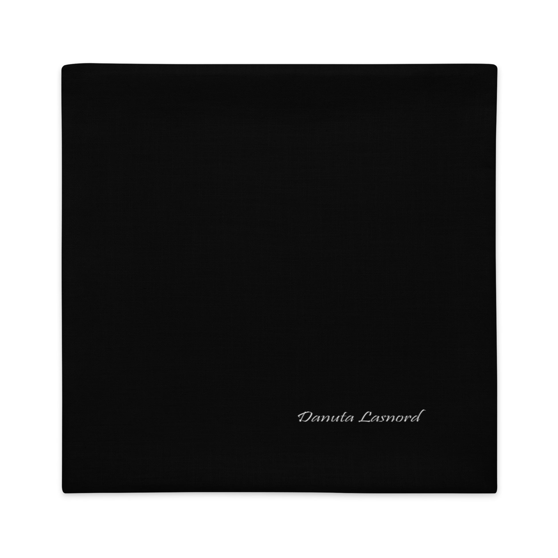 Black square pillow case with 'Danuta Lasnord' branding. Designer nordic cushion covers for livingroom