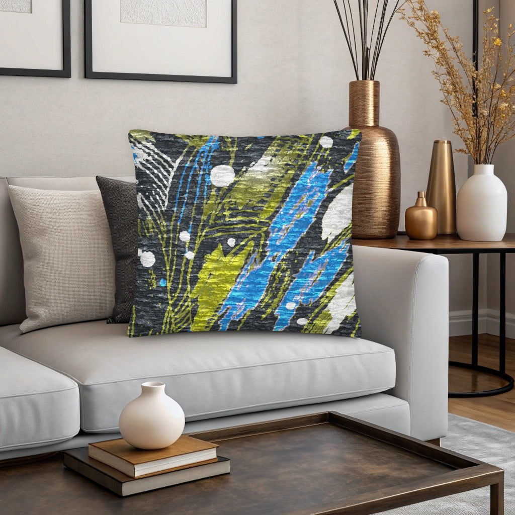 Decorative green gray pillow with abstract design on a sofa in a living room setting. Scandinavian design pillow. luxury cushions for sofa